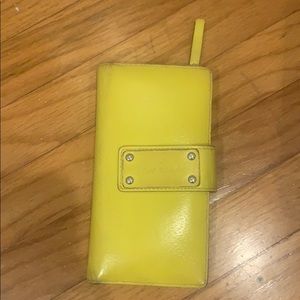 Kate Spade Yellow wallet. Previously used